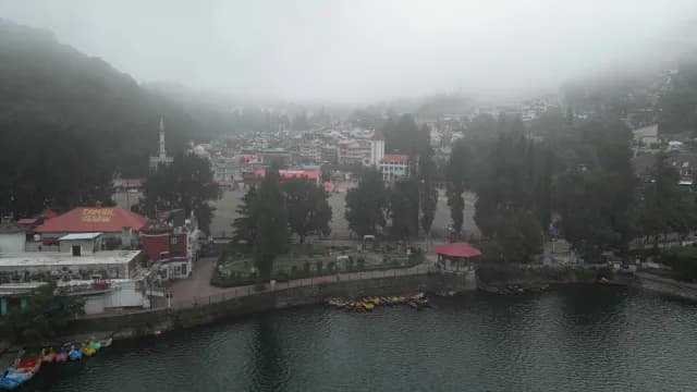 Foggy Aerial View of Naini Lake and Nainital Hill Station