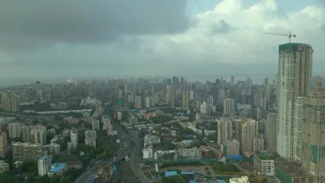 Aerial View of Mumbai Cityscape Under Gloomy Overcast Skies