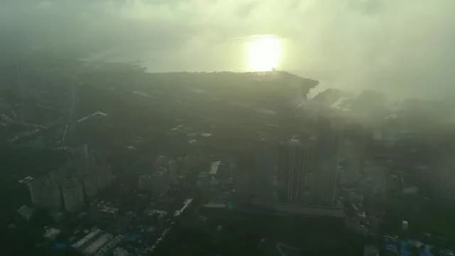 Aerial Sunrise View of Misty Mumbai Skyline and Sea Link