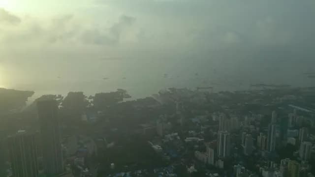 Foggy Aerial View of Mumbai Cityscape and Harbor