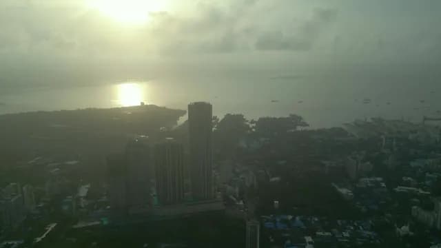 Aerial Sunrise View of Mumbai Skyscrapers and Coastal Skyline
