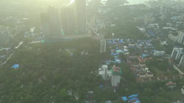 Aerial View of Hazy Mumbai Skyline at Sunrise