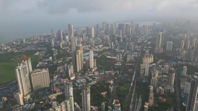Aerial View of Dense Mumbai City Skyline and Coastal Skyscrapers