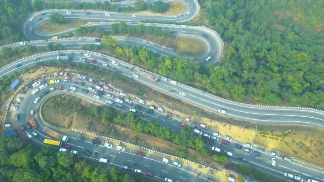 Aerial View of Winding Mountain Highway at patratu valley with Traffic