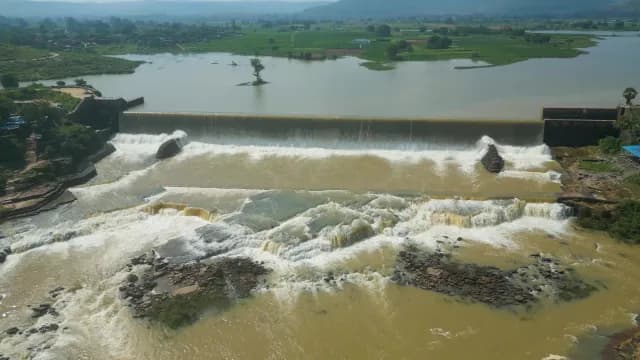 Aerial View of Water Overflowing from Scenic Rural Rajdari Devdari Dam