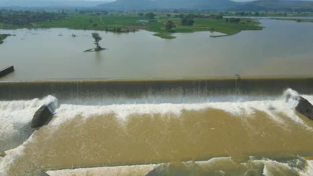 Aerial View of Water Cascading Over Concrete Rajdari Devdari Dam, Varanasi, Uttar Pradesh Spillway