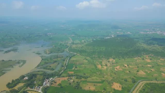 Aerial Panoramic View of Lush Green Rural Landscape and River