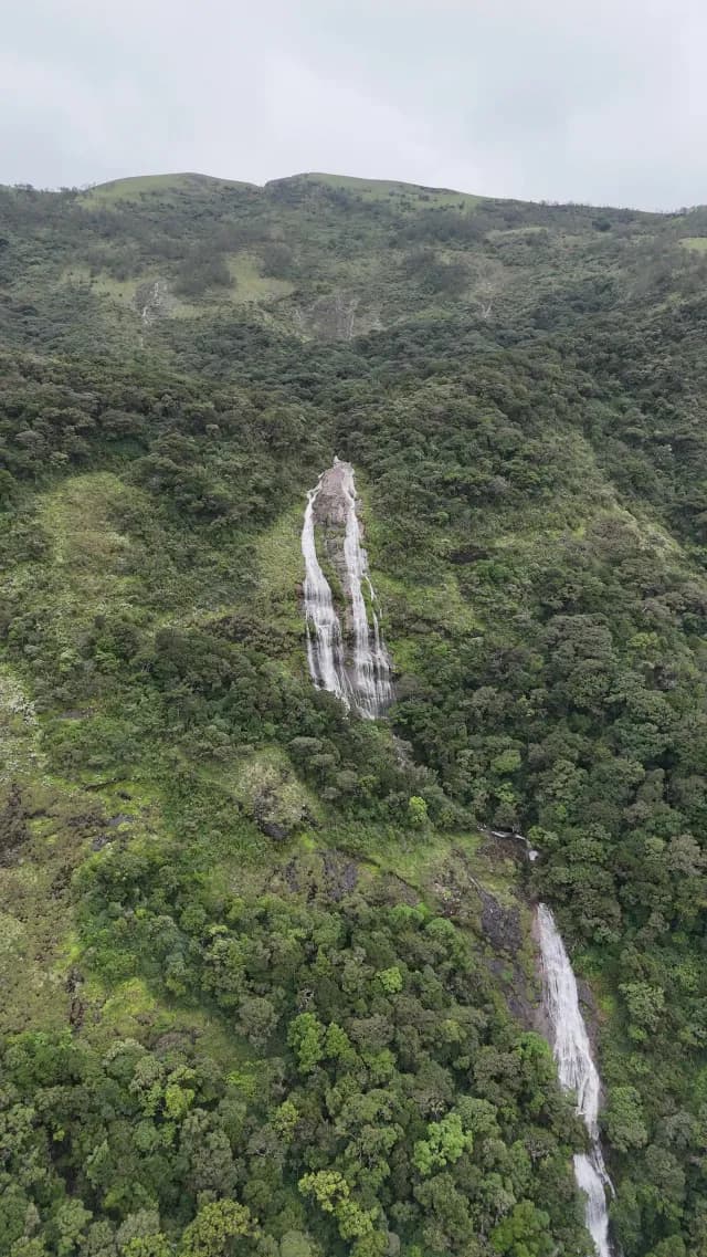 Aerial View of Cascading Nayamakad Waterfall in Munnar