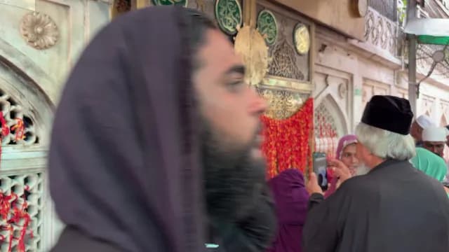 Pilgrims Visiting the Historic Jannati Darwaza at Ajmer Dargah