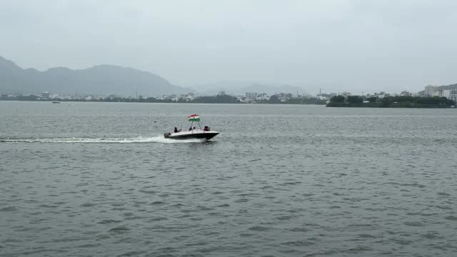 Speedboat with Indian Flag Cruising Scenic Ana Sagar Lake, Ajmer
