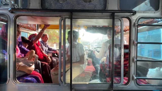 Passengers Traveling Inside a Local Public Bus in Pushkar