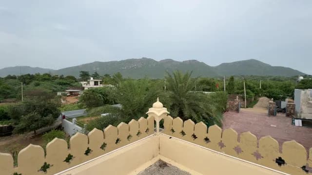 Scenic Rooftop View of Lush Green Aravalli Hills in Rajasthan