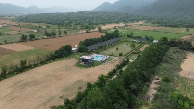 Aerial View of Rural Luxury Resort with Swimming Pool and Aravalli Hills, Rajasthan