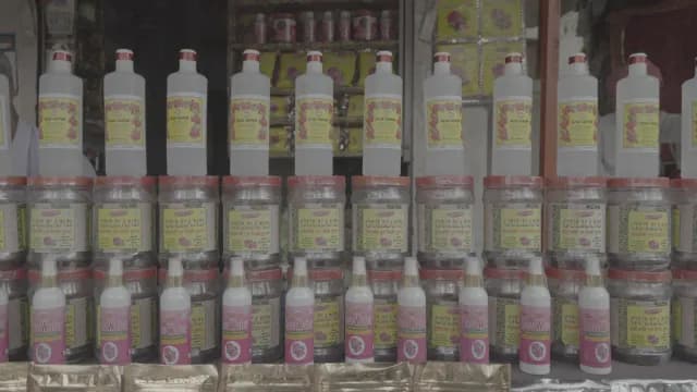 Indian Market Display of Rose Water and Gulkand Jars in Ajmer market.
