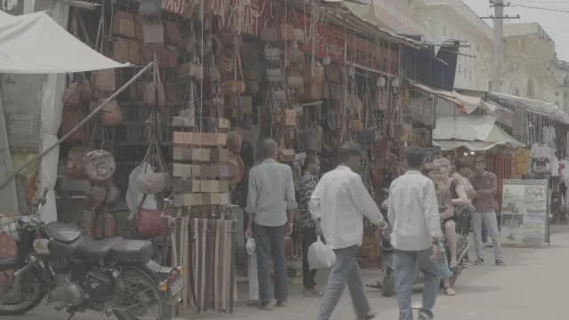 Traditional Leather Goods Stall in Busy Pushkar Market India