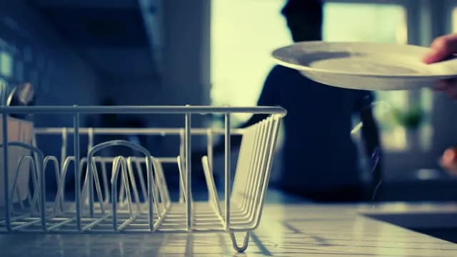 Close-up of Empty Dish Drying Rack in Modern Kitchen