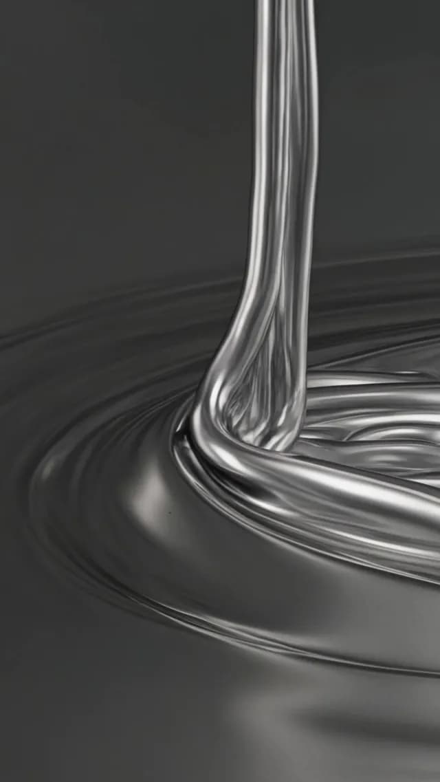 Abstract Liquid Silver Pouring on Reflective Surface
