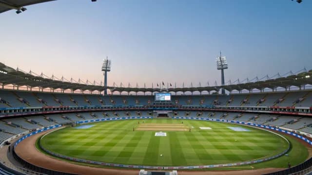 Wide Shot of Empty Cricket Stadium at Twilight