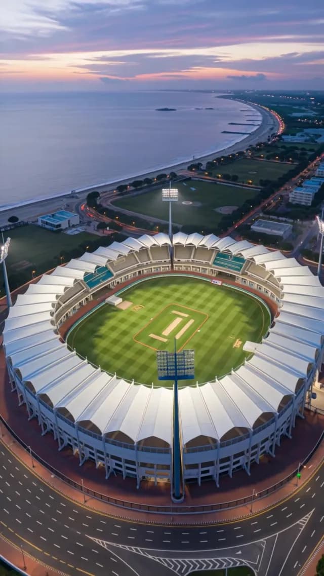 Aerial View of a Modern Cricket Stadium at Twilight