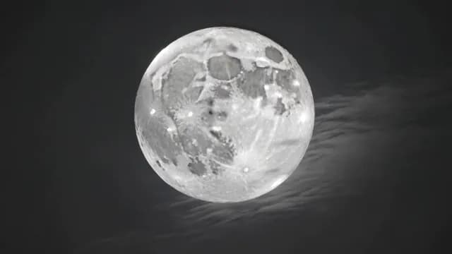Cinematic Full Moon Glowing Through Wispy Night Clouds