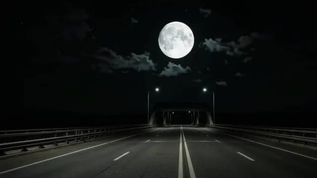 Large Full Moon Shining Over Empty Highway Bridge at Night