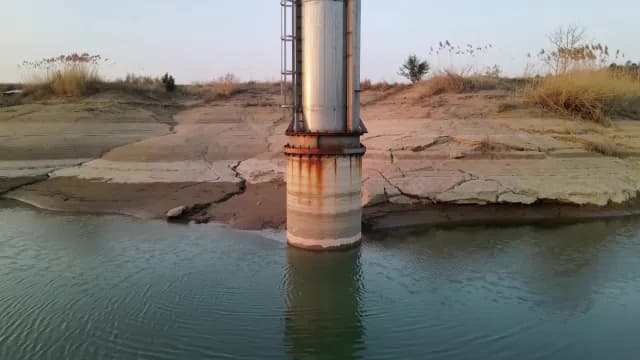 Industrial Water Intake Pipe in Low Level Reservoir During Drought