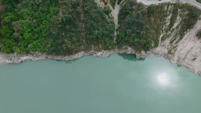 Aerial View of Turquoise Alaknanda River Rudraprayag Road Uttarakhand and Lush Forested Cliffside