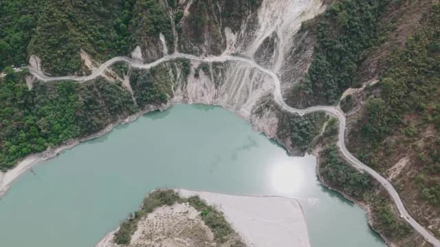 Aerial View of Winding Mountain Road Along Turquoise Alaknanda River, Rudraprayag Road, Uttarakhand