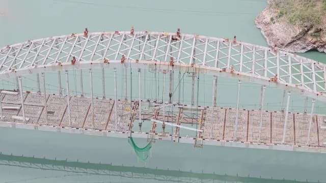Aerial View of Massive Steel Arch Bridge Under Construction Over Alaknanda River, Rudraprayag Road, Uttarakhand