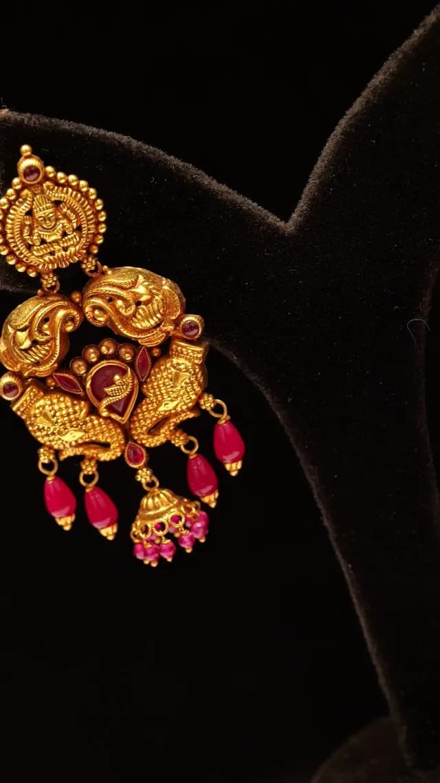Traditional Indian Gold Earring with Ruby Stones on Black Display