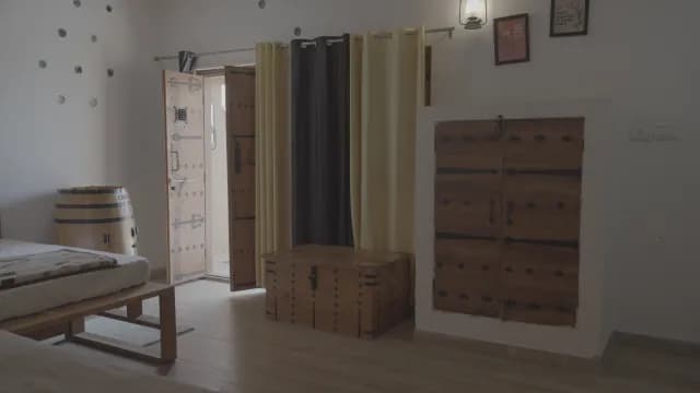 Traditional Rustic Bedroom Interior with Wooden Furniture and Antique Decor