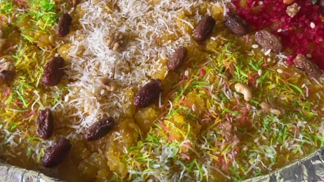Close-up of Traditional Zarda Sweet Rice with Nuts and Dates