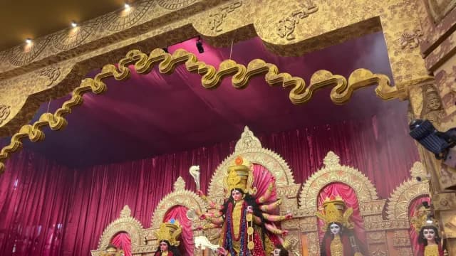 Ornate Goddess Durga Idol Displayed in a Traditional Festival Pandal