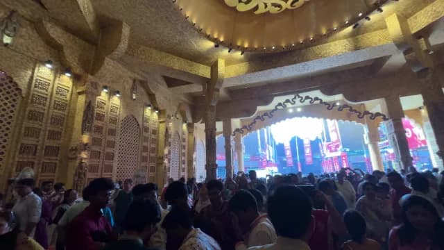Crowds Gather Inside Ornate Durga Puja Pandal in Chittaranjan Park New Delhi