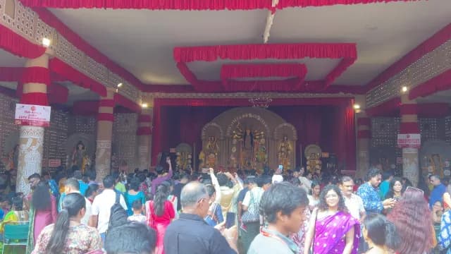 Crowd of Devotees Celebrating Durga Puja Festival at a Pandal