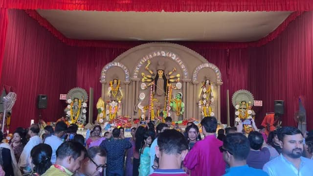 Devotees Gathering at Durga Puja Pandal to See Goddess Durga Idols