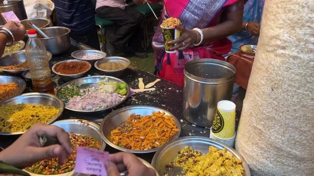Authentic Kolkata Street Food Vendor Serving Spicy Jhalmuri Snack