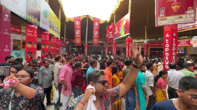 Vibrant Crowd at a Durga Puja Festival Celebration in Delhi