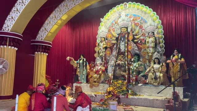 Ornate Goddess Durga Idol and Traditional Fire Ritual in Delhi Pandal