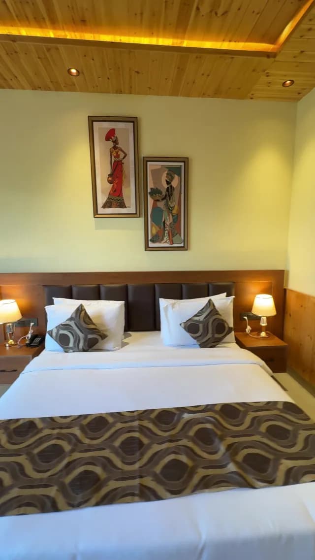 Cozy Hotel Bedroom Interior with Warm Lighting and African Art