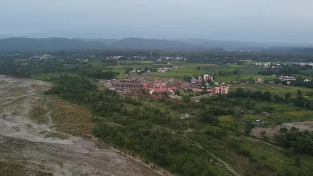 Aerial View of a Pink Hindu Temple Complex in Hanuman Dham, Ramnagar, India